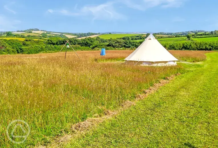 Bell tent with distant views of Dartmoor National Park at Cannamore Camping