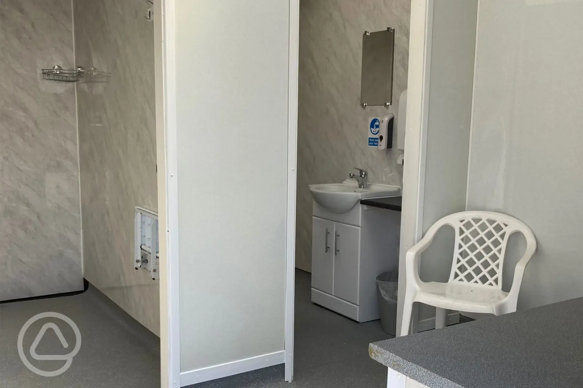 Toilet and shower cubicles at Abbey Farm Caravan and Glamping