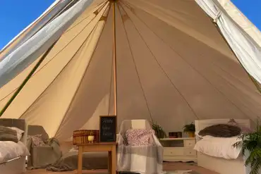 Furnished bell tent looking in