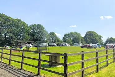 Sussex Topiary Campsite with a small play park and trampoline