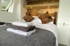 Eight person (Severn) pod king size bedroom with bedding and storage