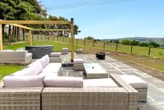 Eight person (Severn) pod with a large patio and hot tub