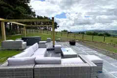 Eight person (Severn) pod with a large patio and hot tub