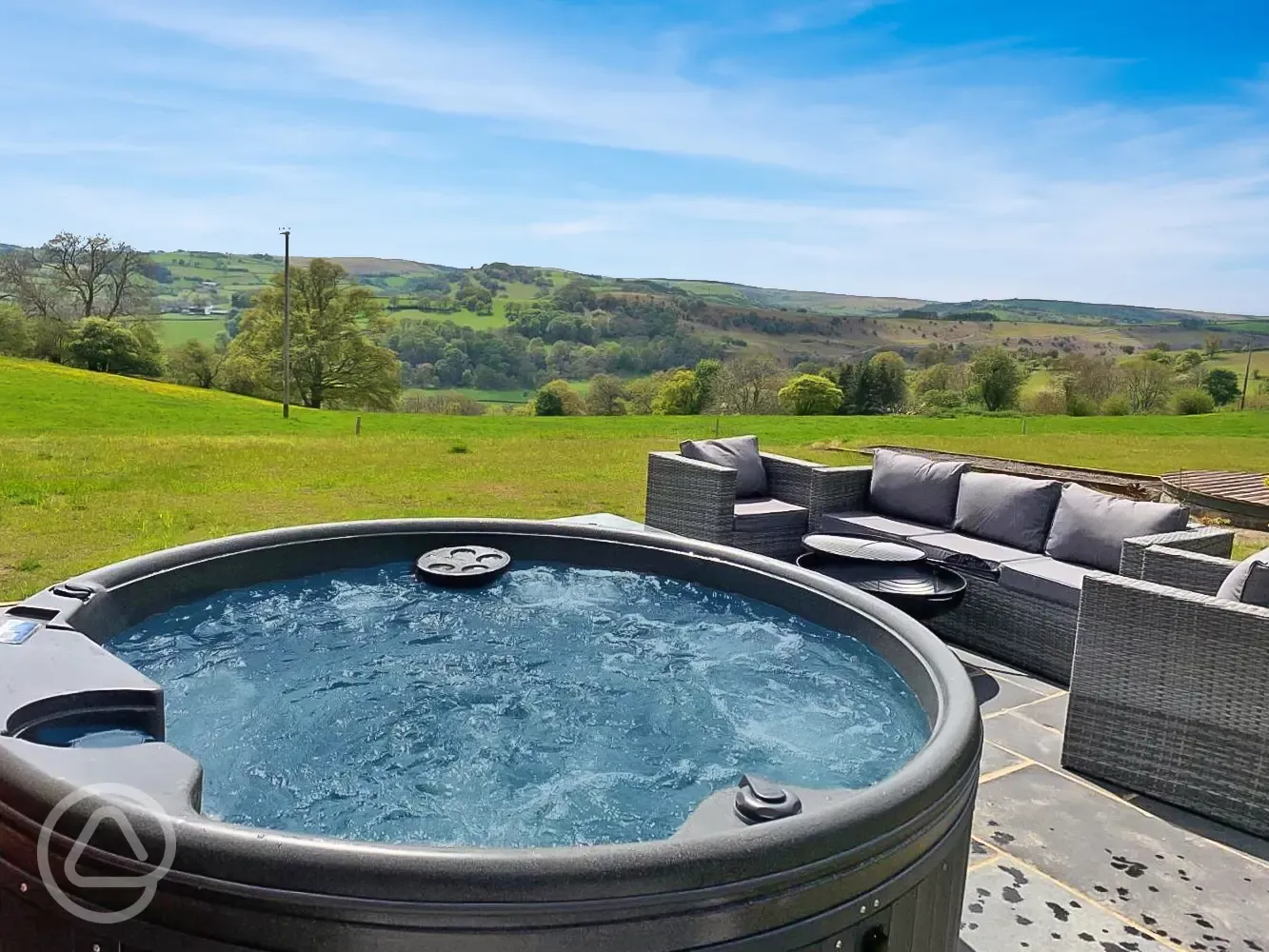 Chwefru and Irfon glamping pod outdoor area and hot tub