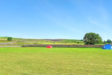 Unmarked non electric grass pitches at White House Farm Campsite