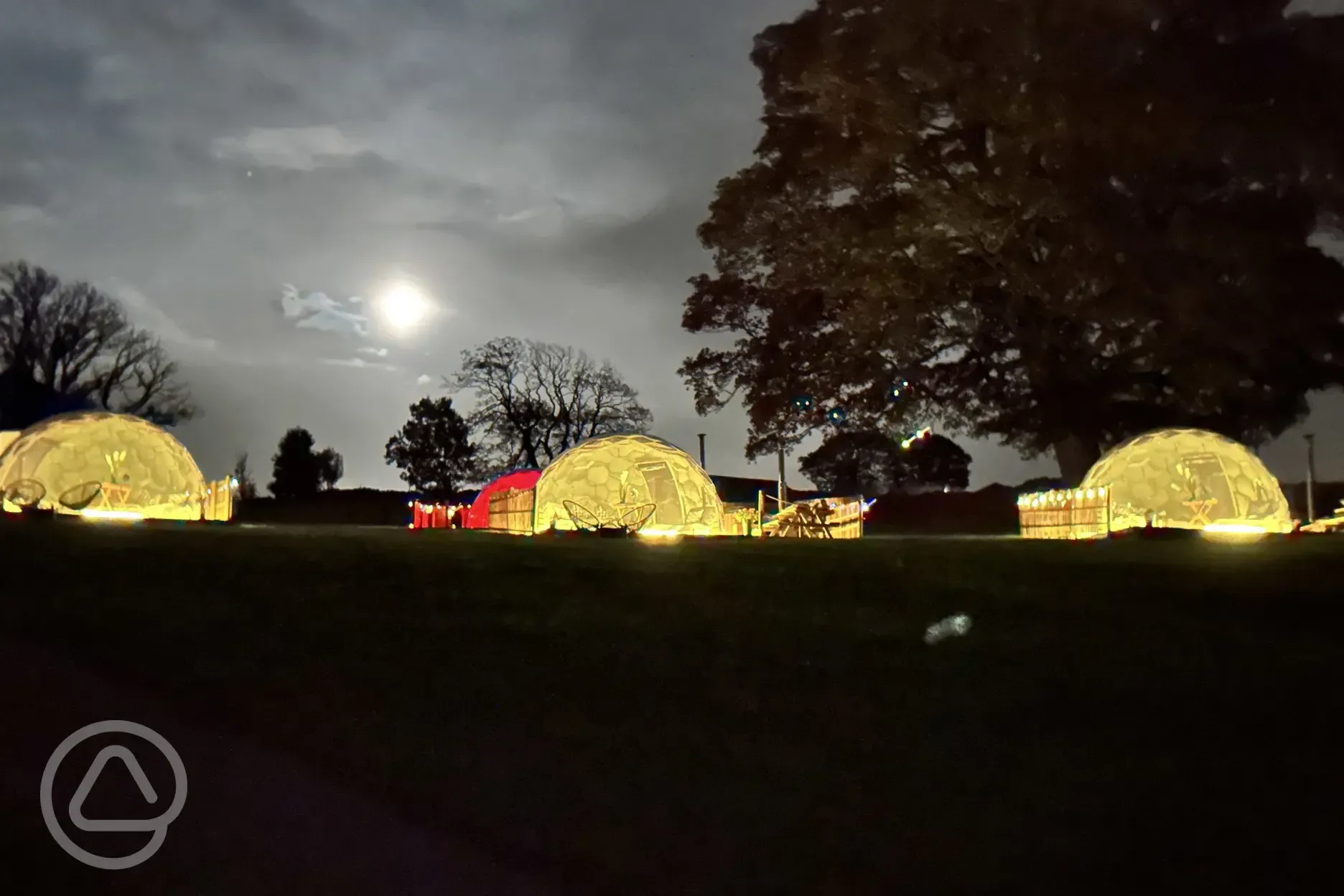 Glamping domes at night