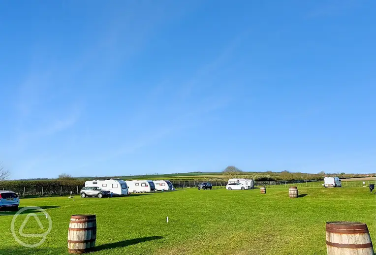 Electric grass touring pitches at West Hale Gate Caravan Site