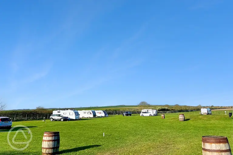 Electric grass touring pitches at West Hale Gate Caravan Site