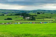 Camping field in the distance