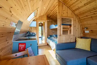 Five person glamping pods with a double bed, single bunk and double sofa bed