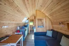 Four person pod with a double bed and double sofa bed (bedding included)