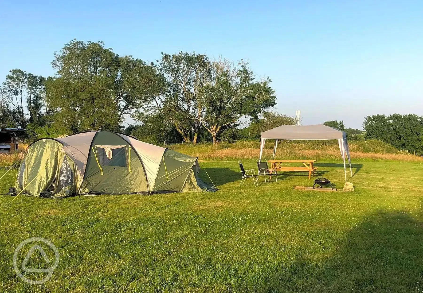 Non electric grass tent pitches