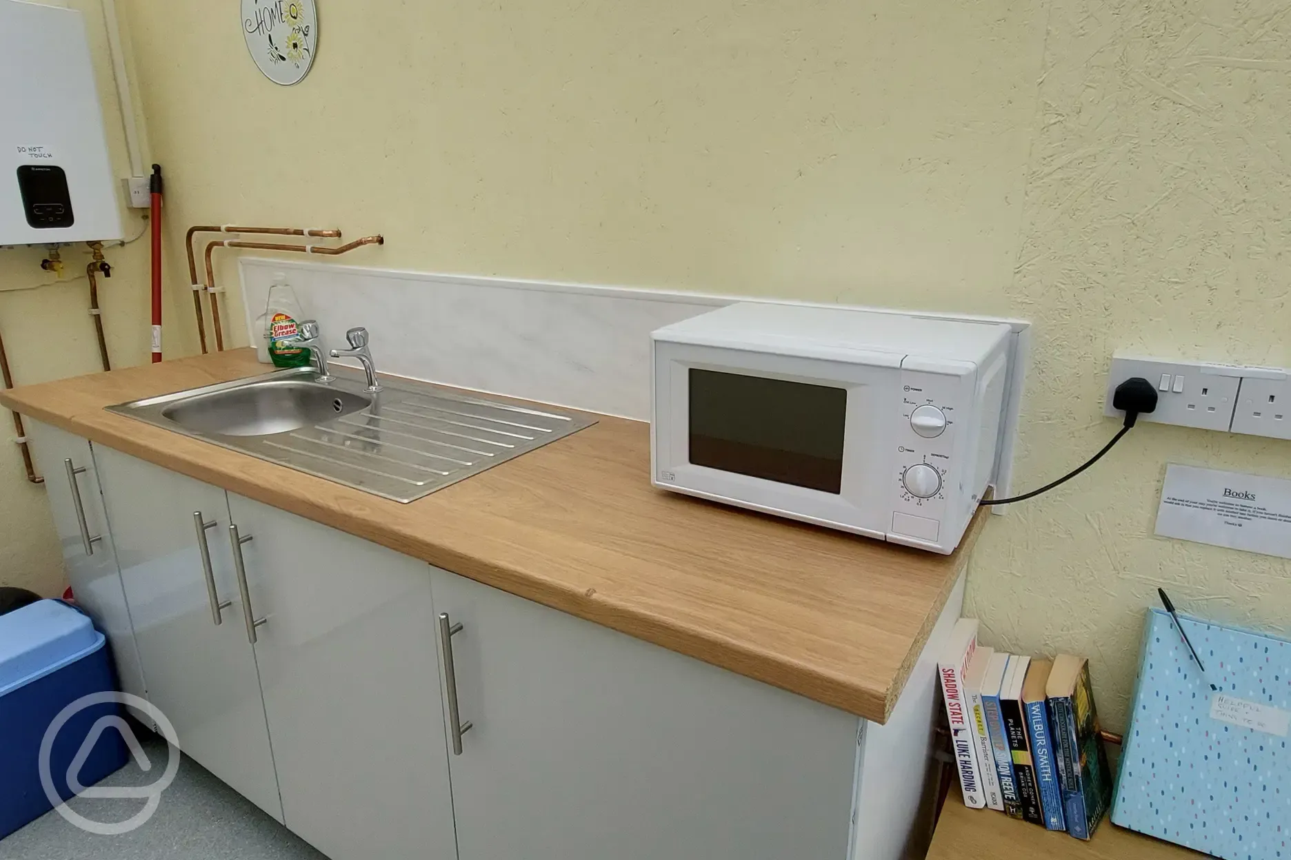 Kitchen facilities with shared fridge and microwave