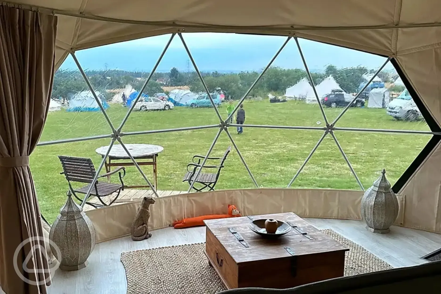 View of the camping pitches from inside the 4m geodome