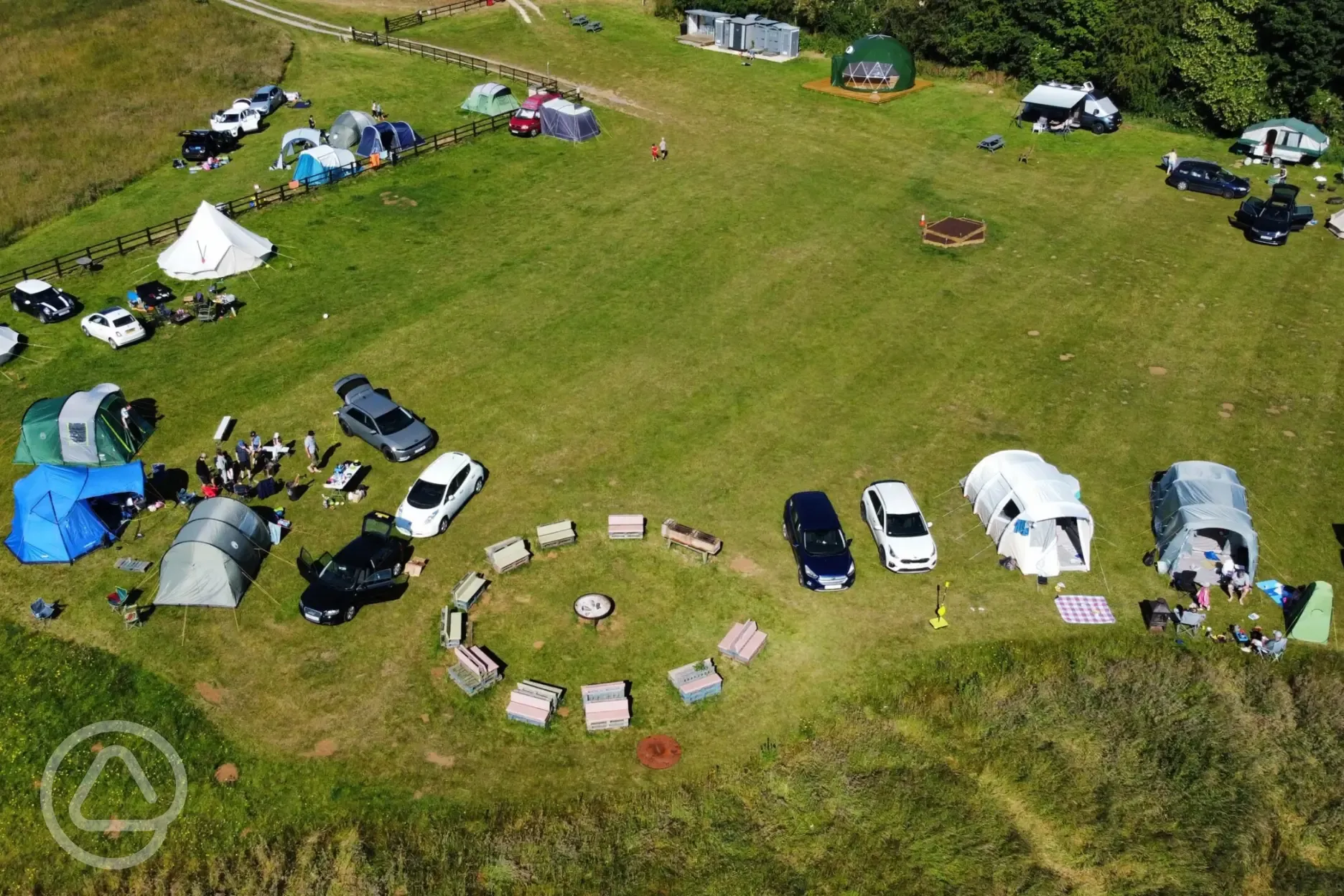 Aerial view of the pitches and glamping units at Greenacres Campsite