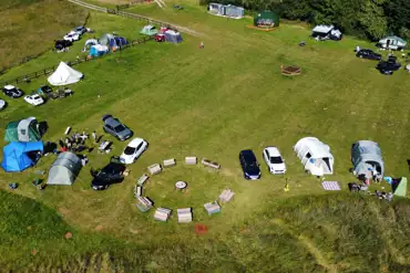 Aerial view of the pitches and glamping units at Greenacres Campsite