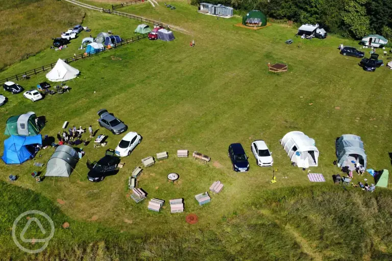 Aerial view of the pitches and glamping units at Greenacres Campsite