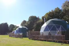 Glamping domes with private decking areas