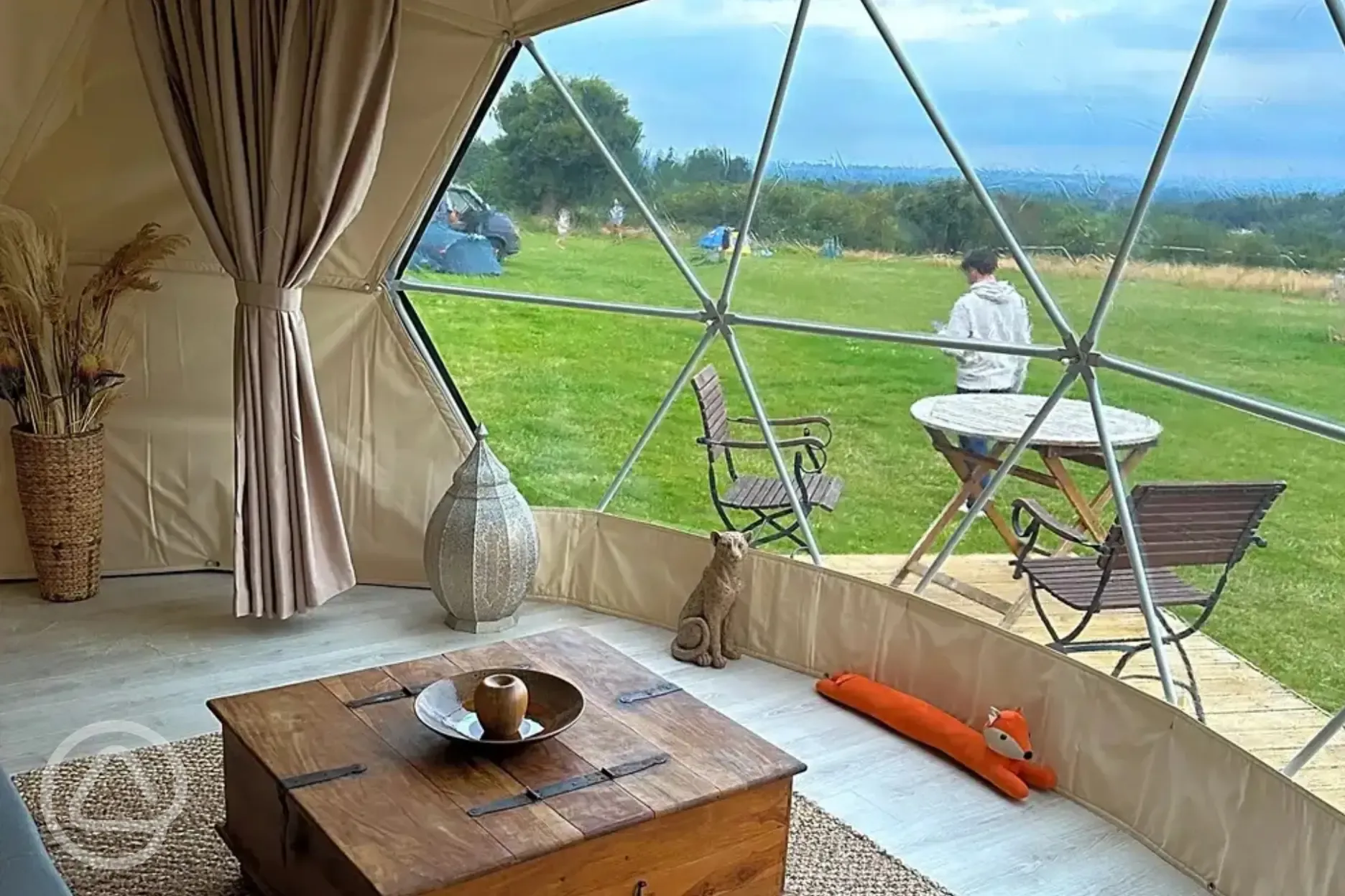 View of the camping pitches from inside the 4m geodome