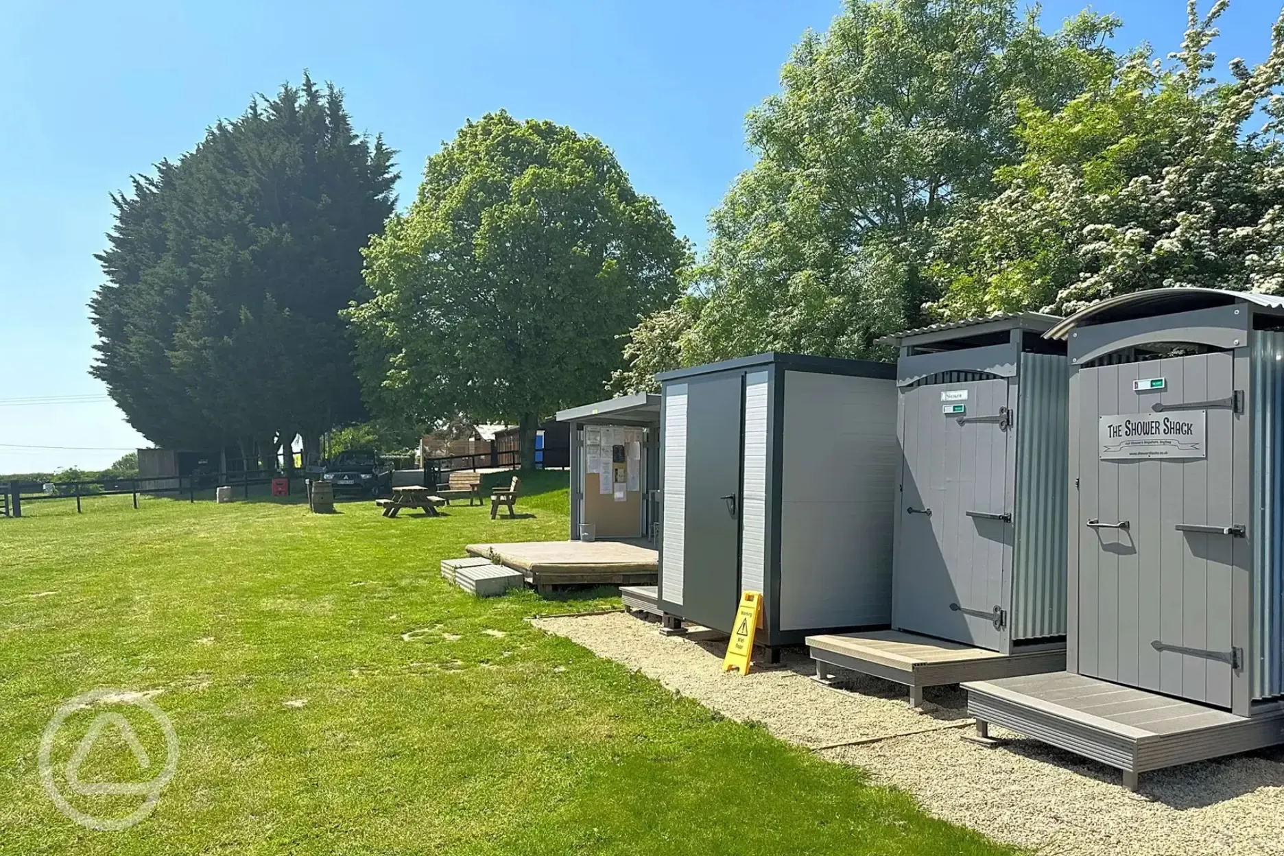Communal toilet and shower block with the outside washing up area next door