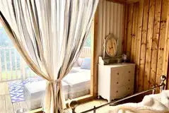 Ebb and Flow glamping cabin bedroom Ebb and Flow glamping cabin bedroom