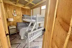 Ebb and Flow glamping cabin bunk bedroom Ebb and Flow glamping cabin bunk bedroom