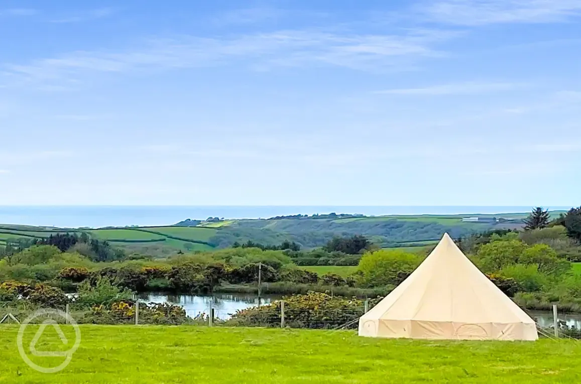 Unfurnished bell tent and sea views