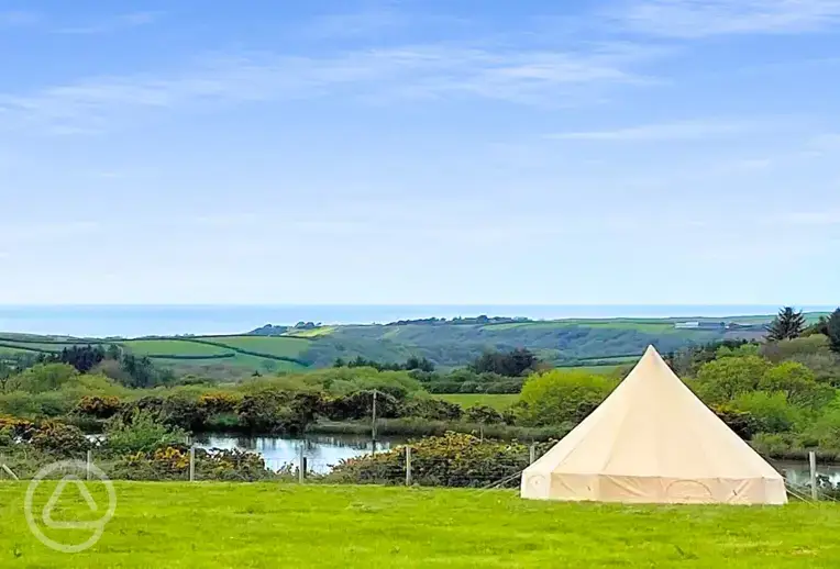 Unfurnished bell tent and sea views