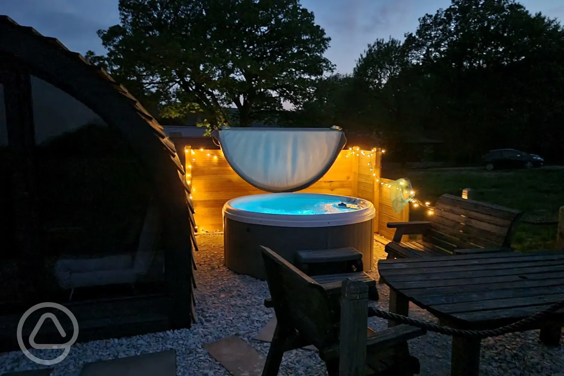 Robin glamping pod hot tub at night