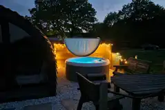 Robin glamping pod hot tub at night Robin glamping pod hot tub at night