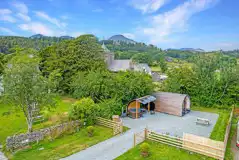 Aerial of the glamping pod and hot tub at Church House overlooking Coniston Aerial of the glamping pod and hot tub at Church House overlooking Coniston
