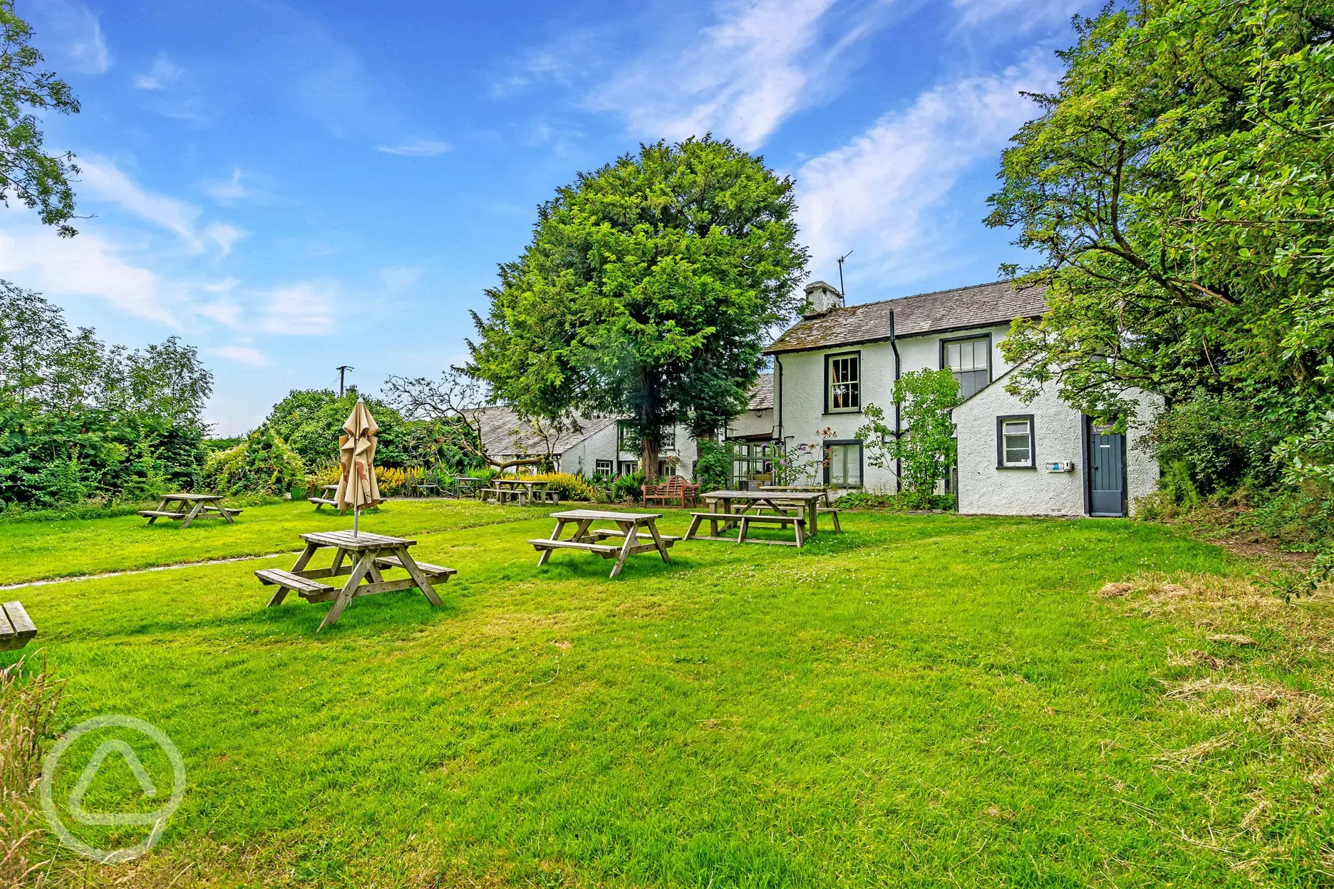 The Church House Inn pub garden with picnic tables