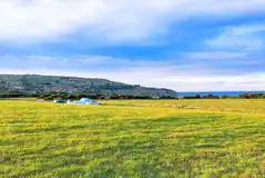 Non electric grass pitches with Robin Hood's Bay views