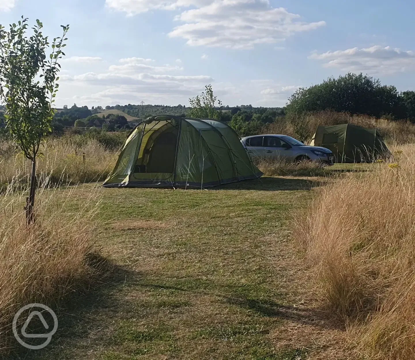 Grass pitches surrounded by fields