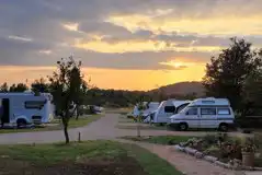 Electric hardstanding pitches at sunset Electric hardstanding pitches at sunset