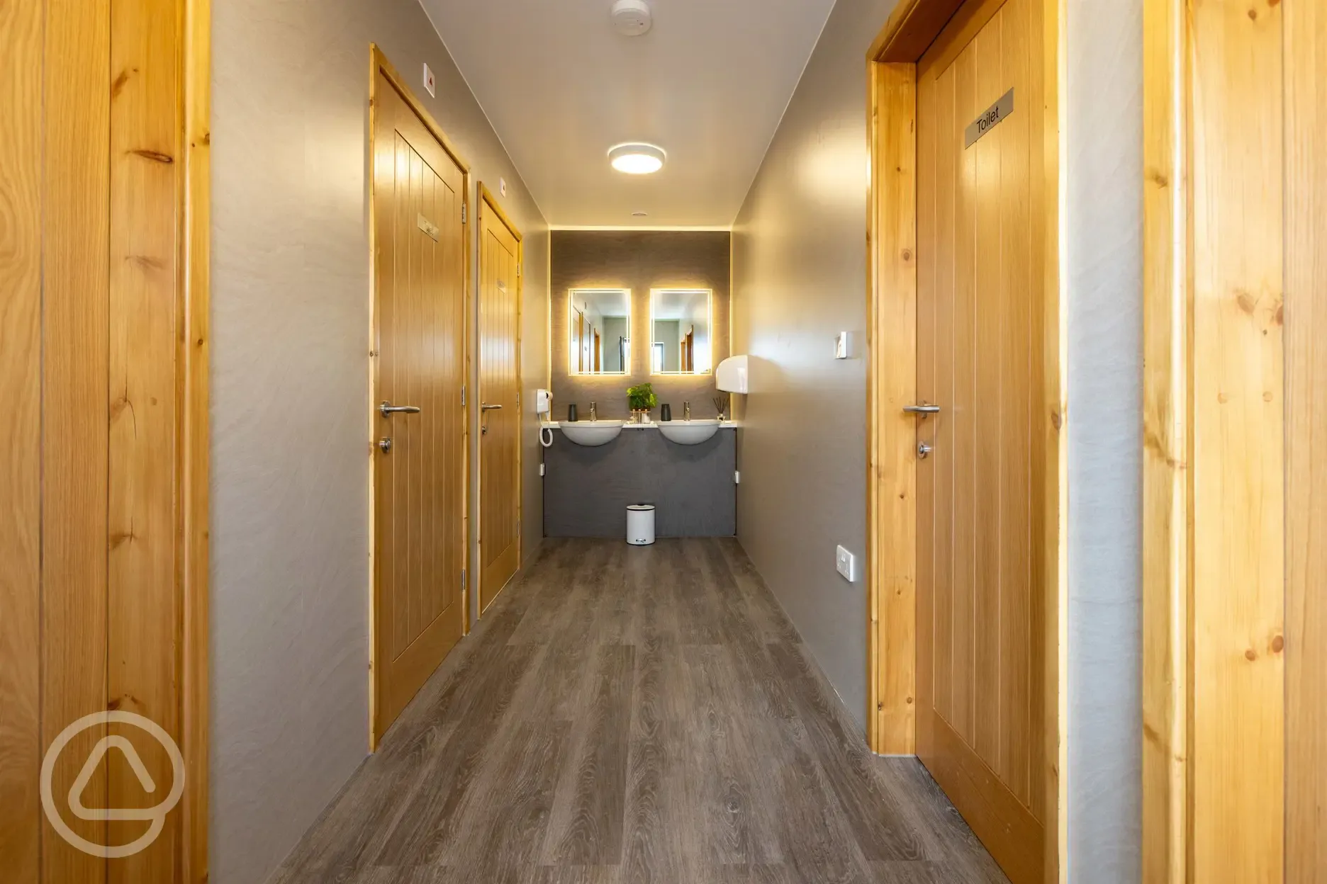 Modern facilities block with hand basins ands toiletries