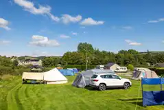 Electric grass tent pitches with 10 amp hook ups