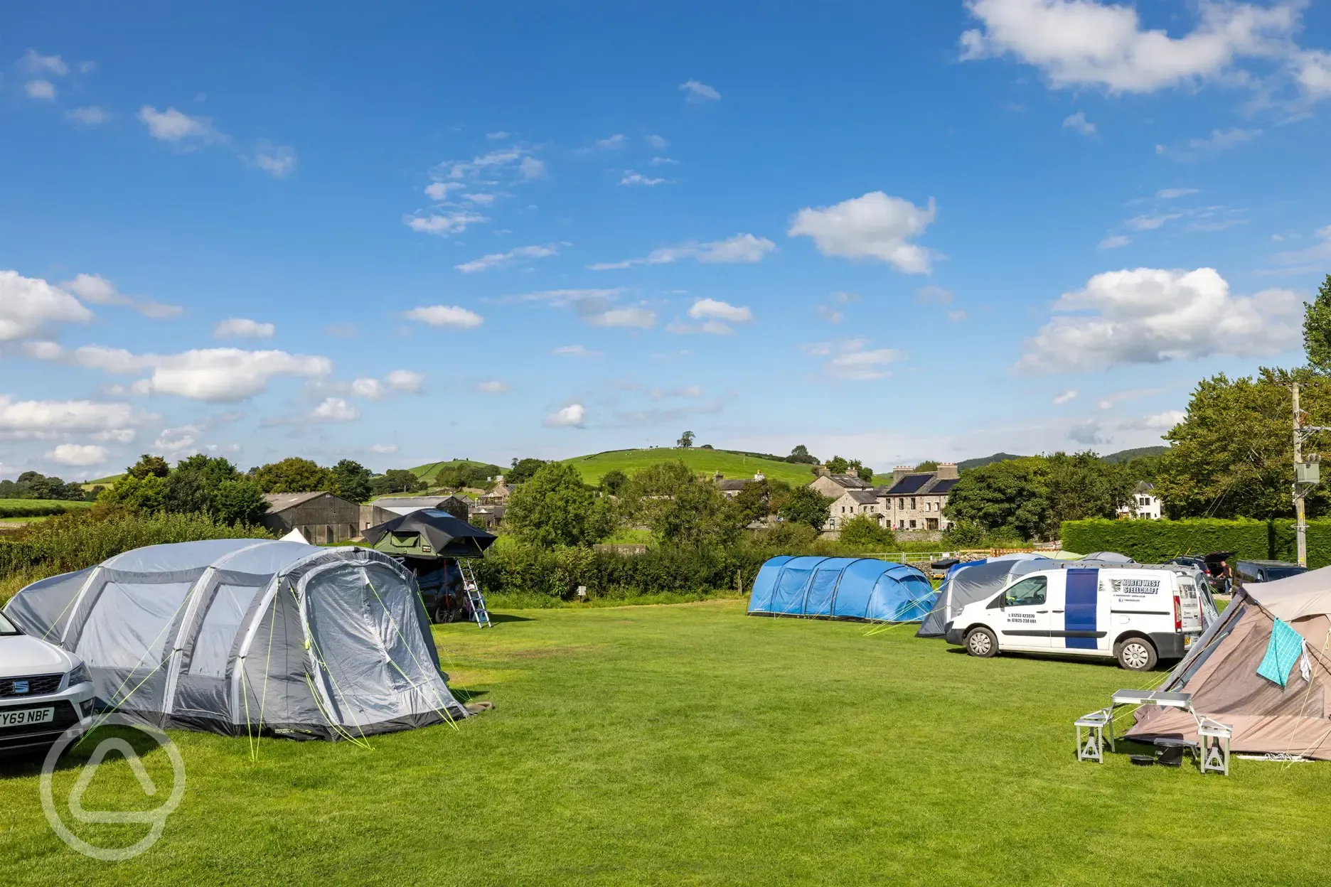 Grass tent pitches (non electric and electric options available)