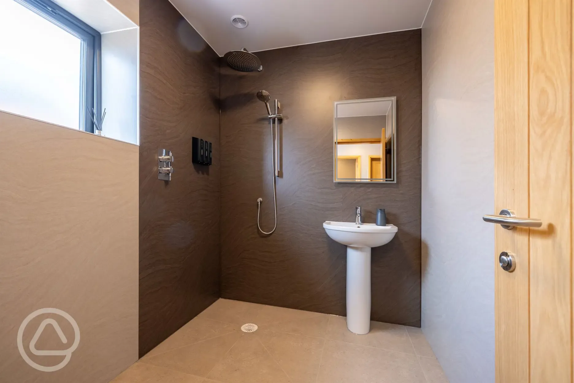 Shower wet room with a hand basin