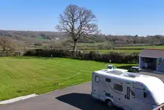 Electric hardstanding pitches with countryside views