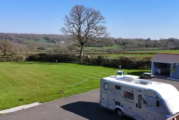 Electric hardstanding pitches with countryside views