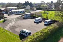 Aerial of the hardstanding pitches backed by hedges