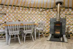 Silver Birch yurt with hot tub - dining area and stove