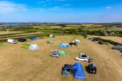 Aerial of the non electric grass pitches for tents, roof tents and trailer tents Aerial of the non electric grass pitches for tents, roof tents and trailer tents