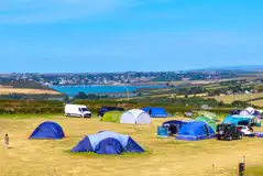 Non electric grass pitches with views over Padstow and the estuary Non electric grass pitches with views over Padstow and the estuary