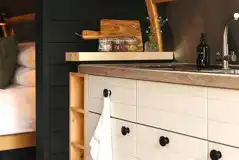 Quarry pod kitchenette with fridge, freezer box, microwave, kettle and toaster