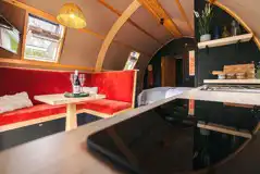 Quarry pod interior with seating and kitchenette