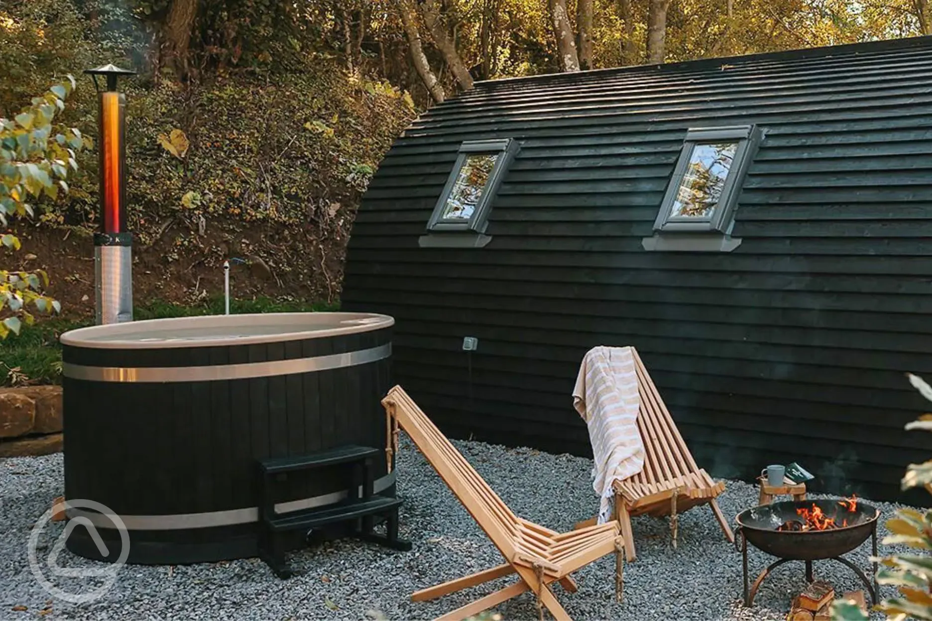 Quarry pod exterior with hot tub and Nordic seating