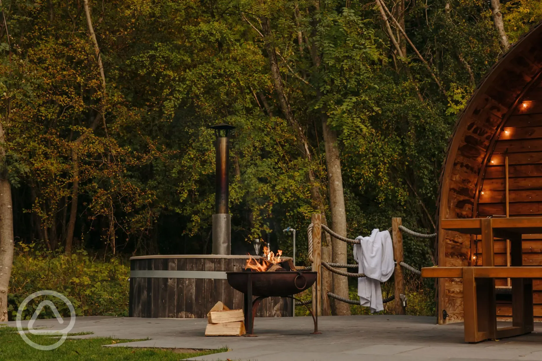Wood fired hot tub and fire pit