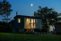 Angharad ensuite poacher's hut at night